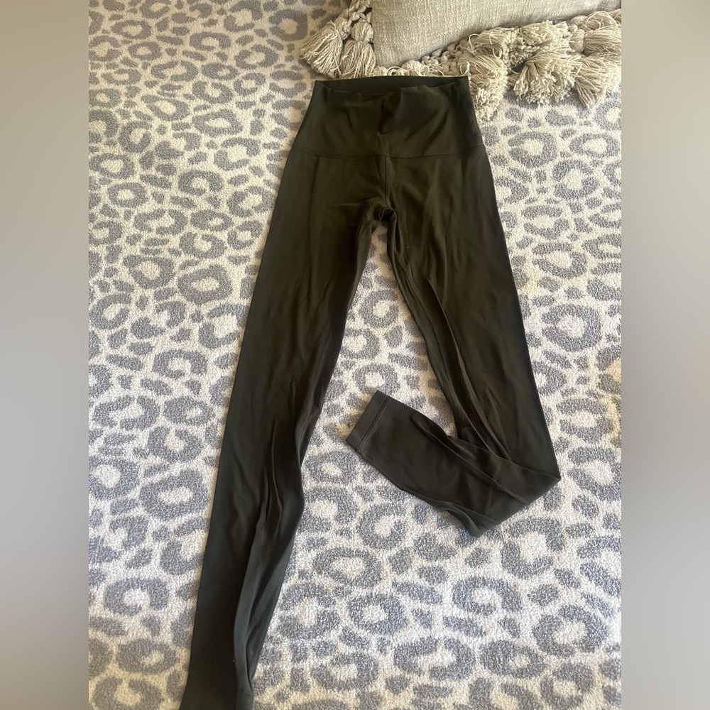 Dark green lululemon leggings.